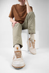 WYRE off-white & cognac nappa sneakers.
