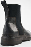 YALE matte-black welted chelsea boots.