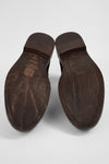 YALE matte-black welted oxford lace up boots.