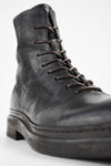 YALE matte-black welted oxford lace-up boots.