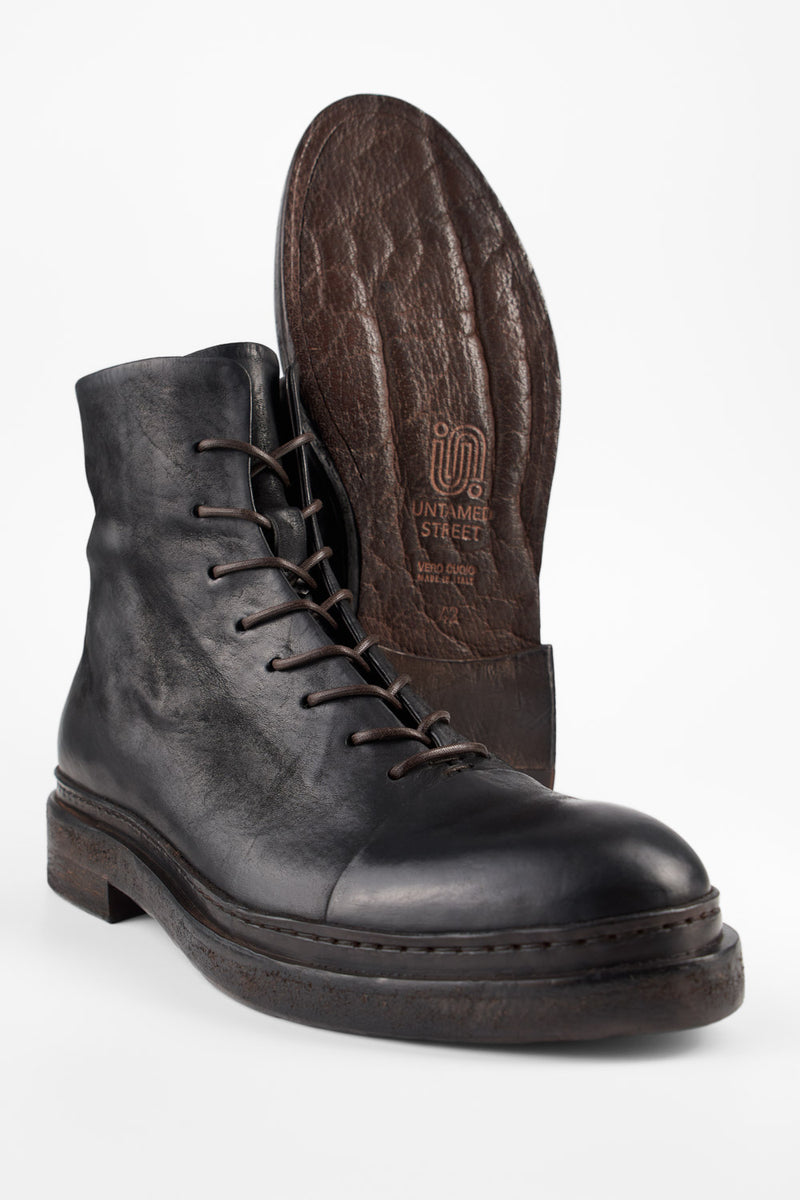 YALE matte-black welted oxford lace-up boots.