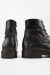 YALE matte-black welted oxford lace-up boots.