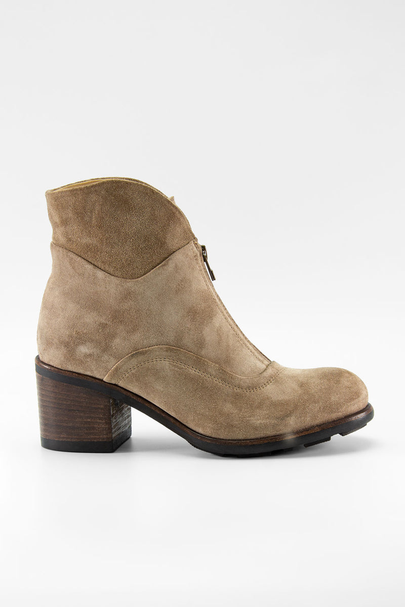 RILEY light-sand suede boots.