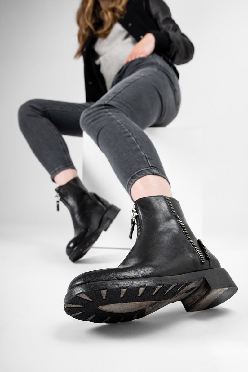 ASTON urban-black front-zip ankle boots.