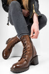 REGENT caramel-brown lace-up boots.