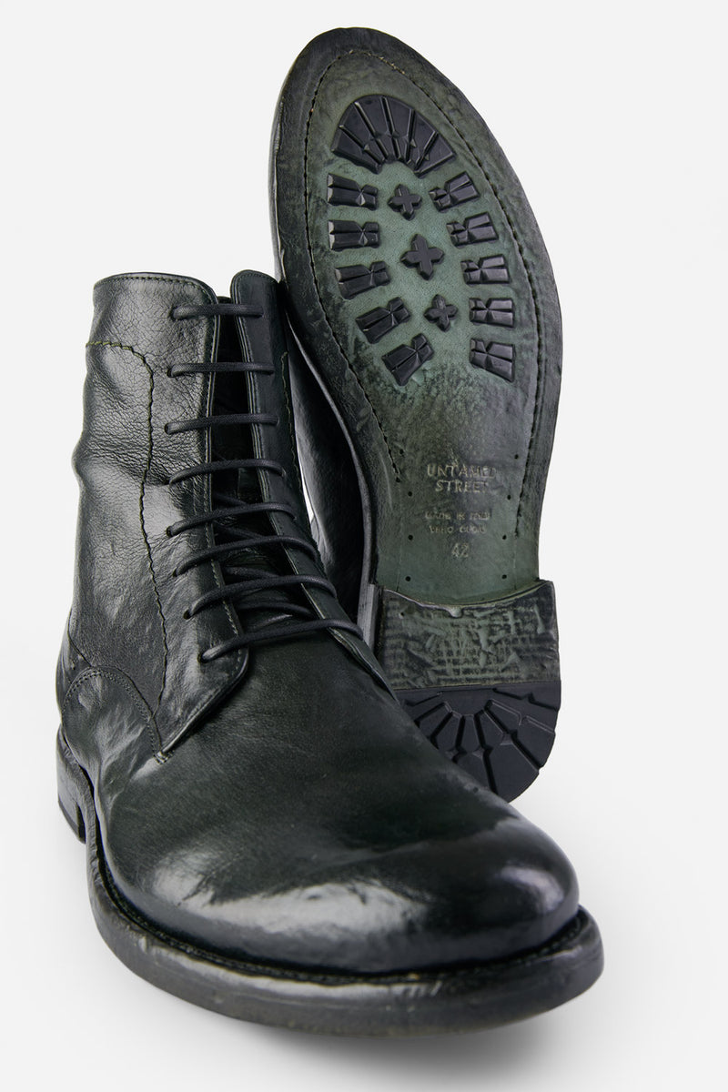 SLOANE dark-green commando boots.