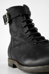 SLOANE matte-black lace-up buckle boots.