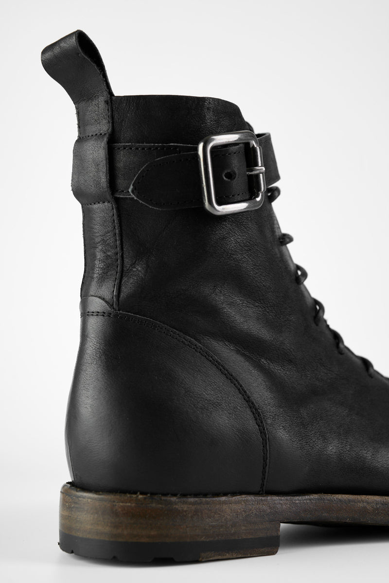 SLOANE matte-black lace-up buckle boots.