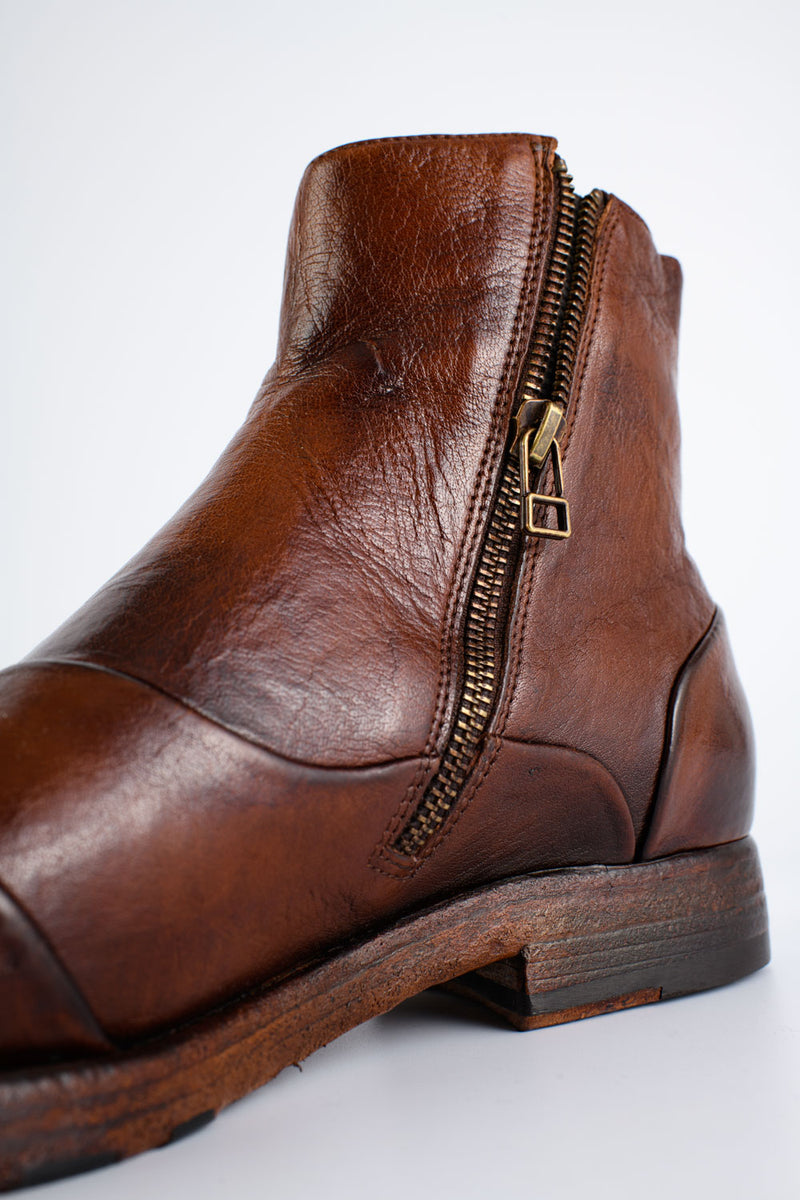 ASTON EDGE cognac laceless ankle boots.