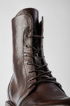 AVERY dark-plum lace-up boots.