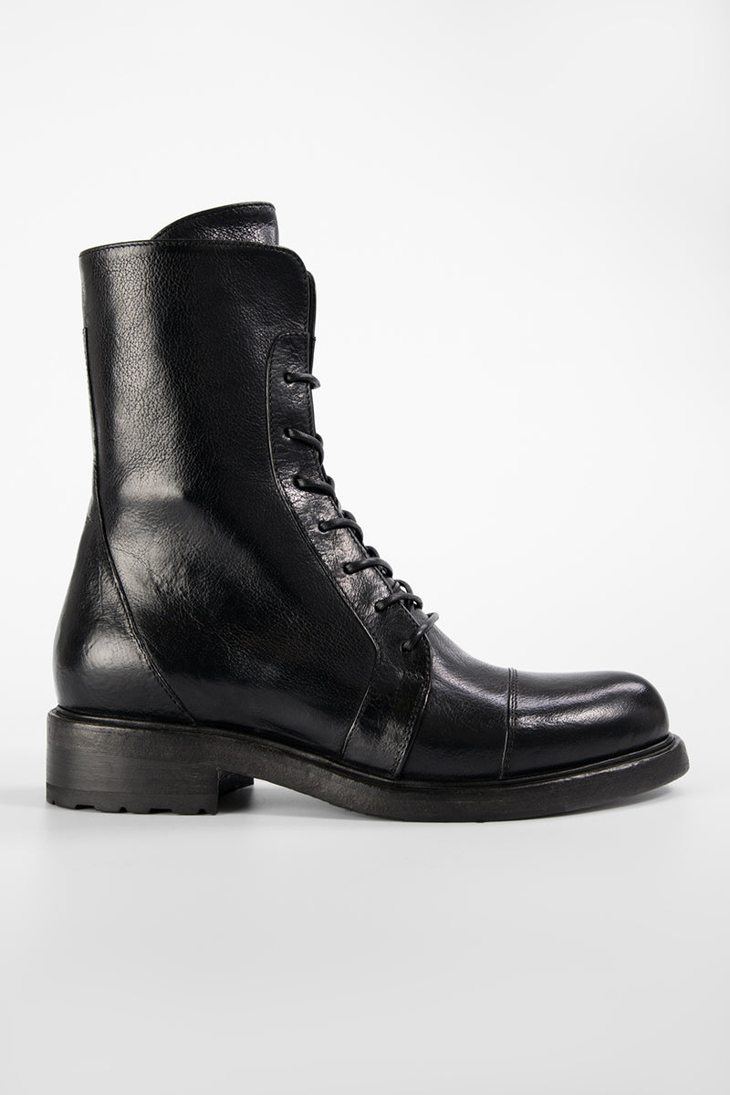 AVERY jet-black lace-up boots.