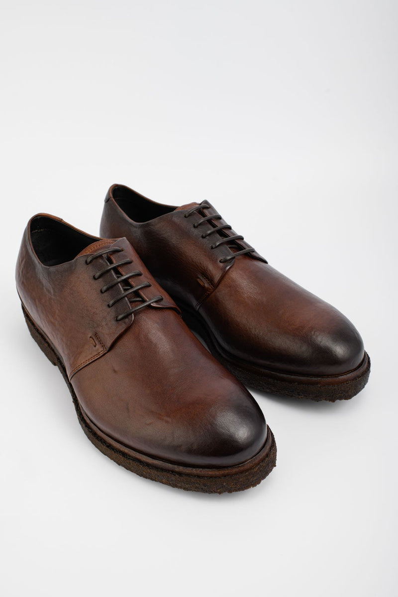 BROMPTON terra-brown derby shoes.