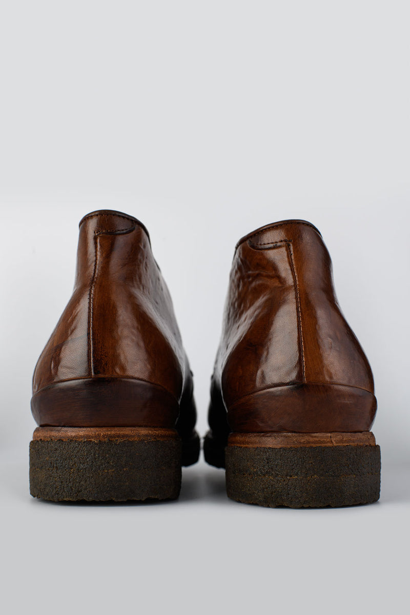 BROMPTON rich-brown chukka boots.