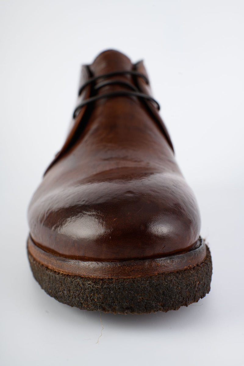 BROMPTON rich-brown chukka boots.