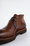 BROMPTON rich-brown chukka boots.