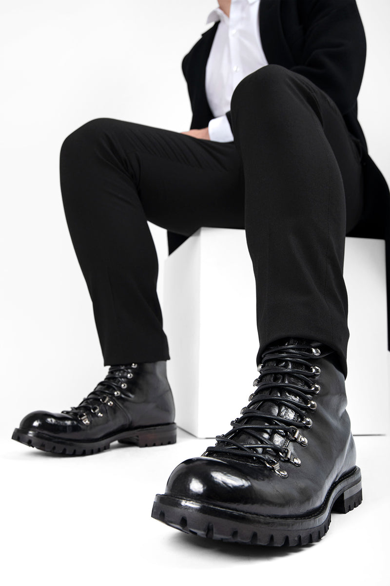 CAMDEN tar-black combat boots.