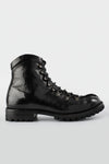 CAMDEN tar-black combat boots.