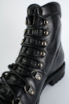 CAMDEN tar-black combat boots.