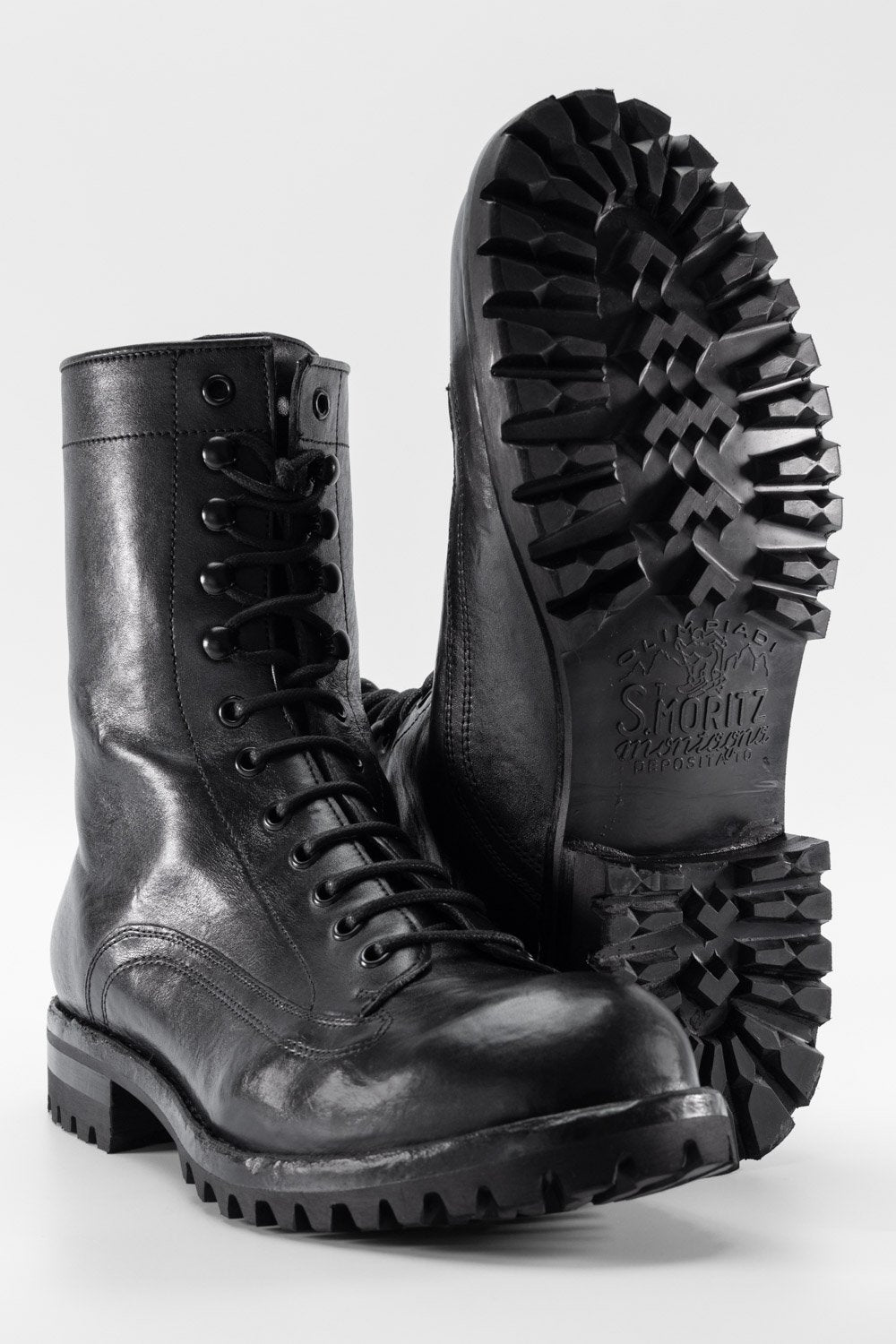 CAMDEN tar-black military boots.