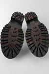 CAMDEN tar-black hiking boots.