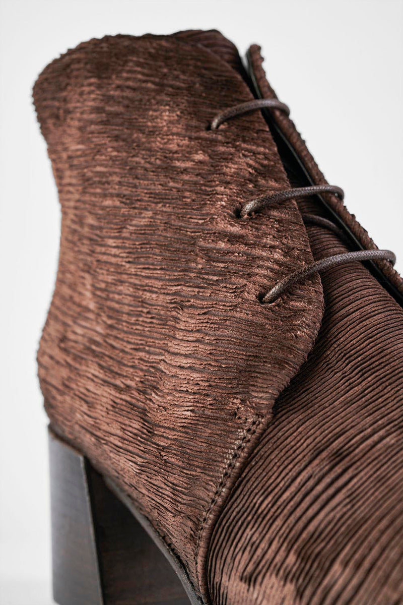 CAROE coffee-brown carved leather lace-up boots.