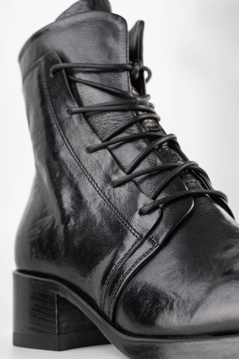 EXETER jet-black lace-up boots.