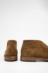 HAVEN desert-dust suede chukka boots.