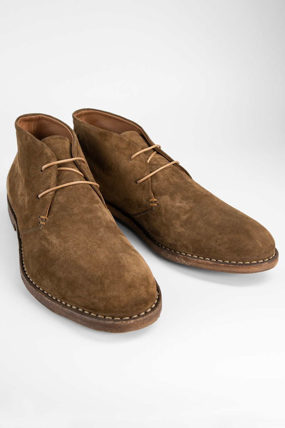 HAVEN desert-dust suede chukka boots.