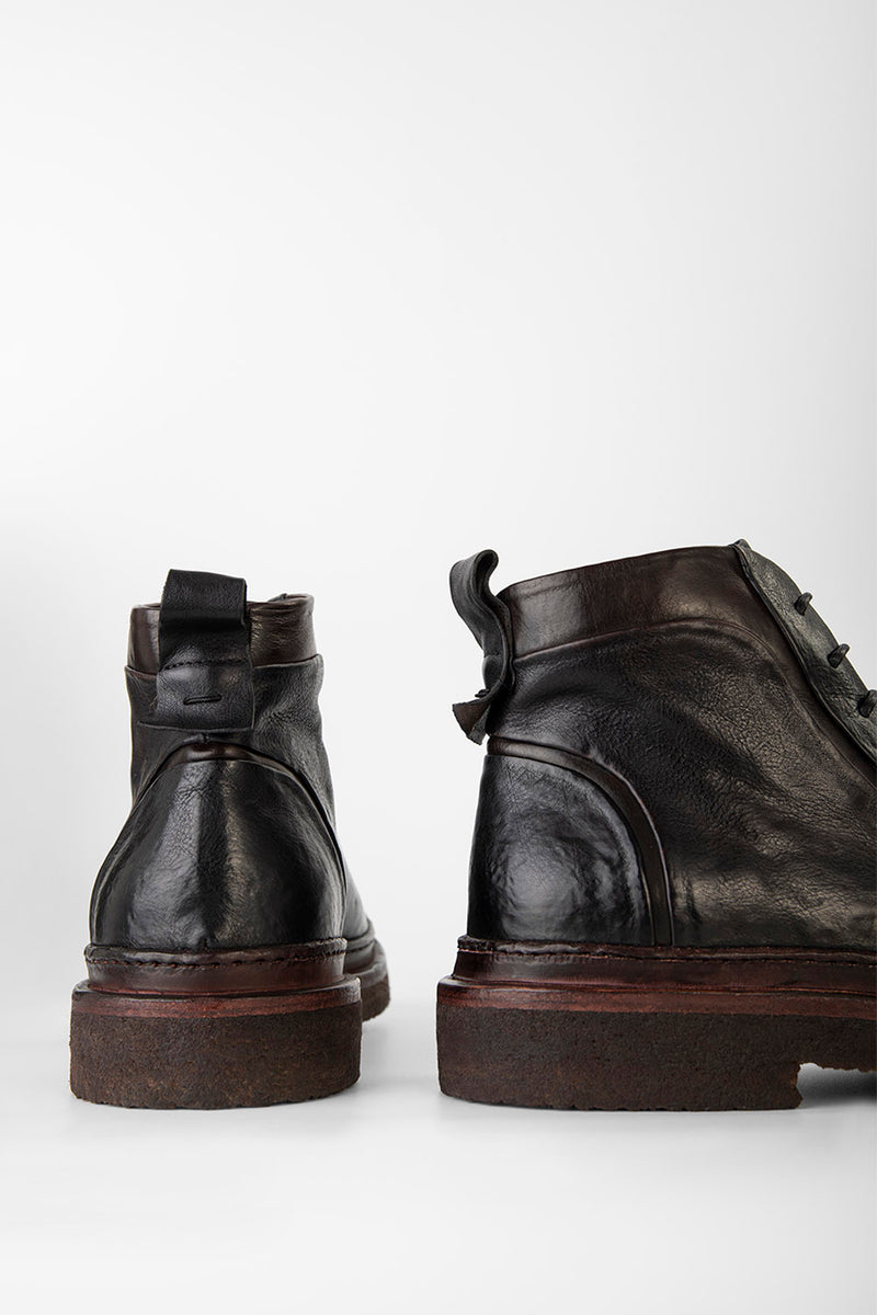 HOVE jet-black welted lace-up boots.