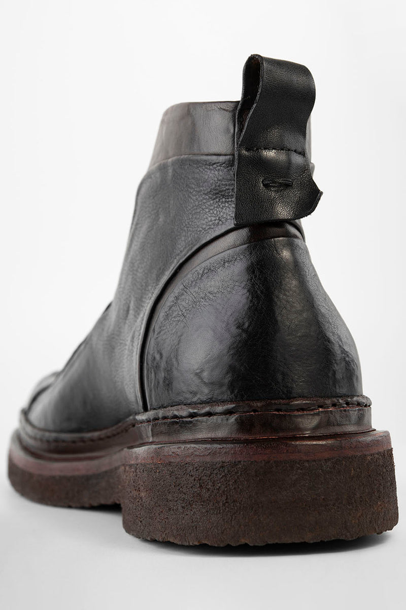 HOVE jet-black welted lace-up boots.