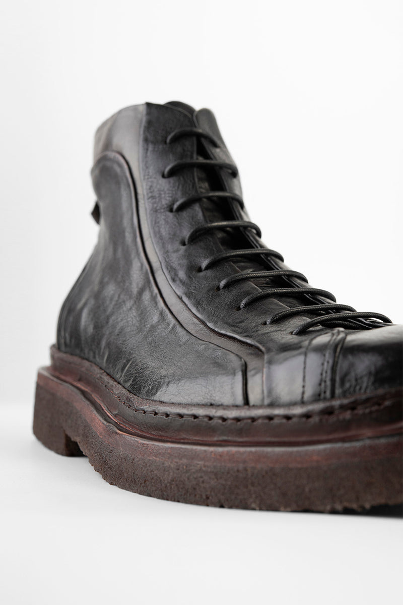 HOVE jet-black welted lace-up boots.