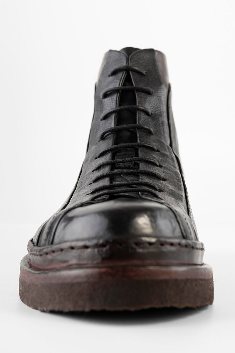 HOVE jet-black welted lace-up boots.