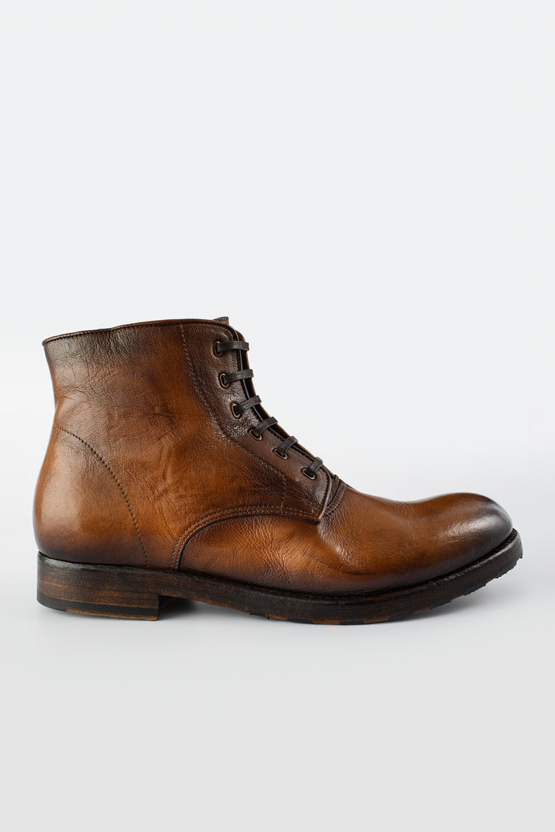 ASTON dry-terra asymmetric ankle boots.