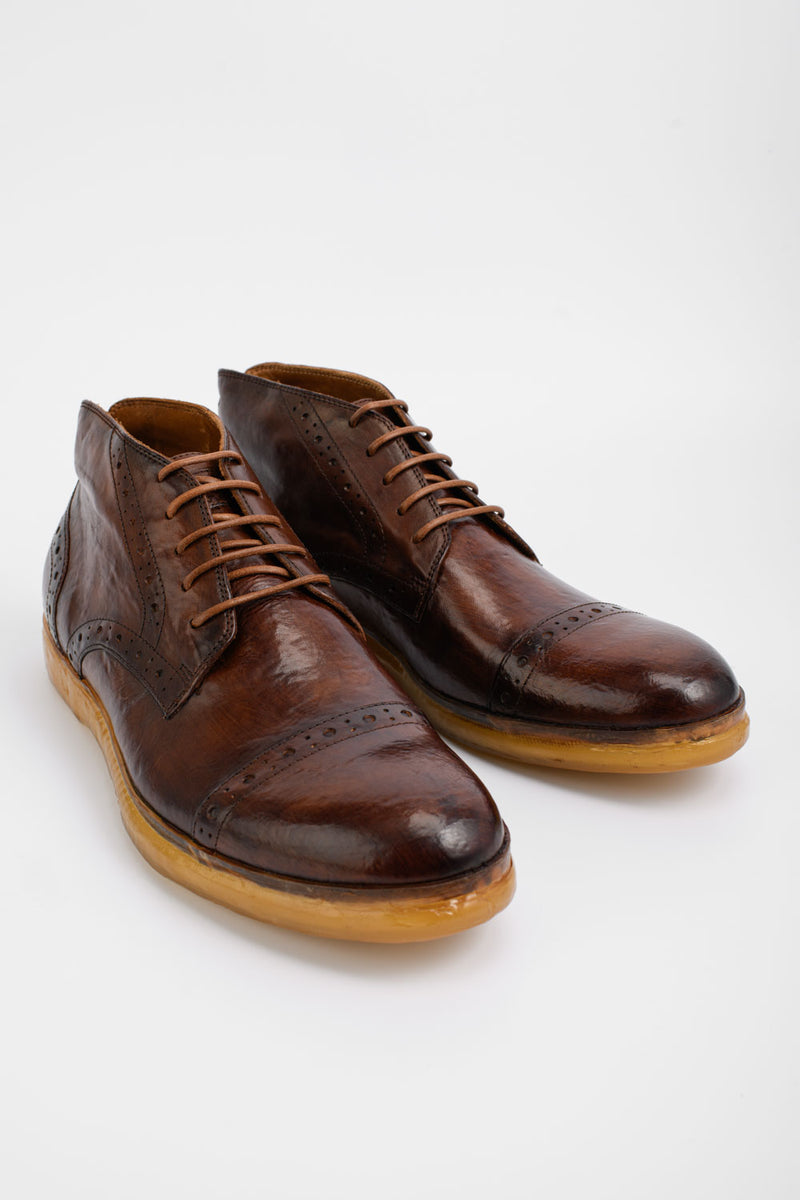 HAMPTON rich-umber brogue chukka boots.