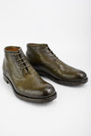 ASTON hunter-green chukka boots.