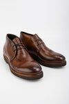 BROMPTON rich-brown chukka boots.