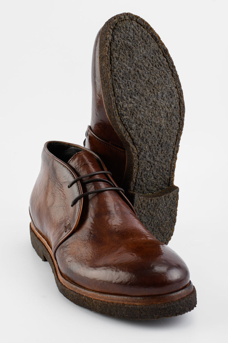 BROMPTON rich-brown chukka boots.