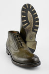 ASTON hunter-green chukka boots.