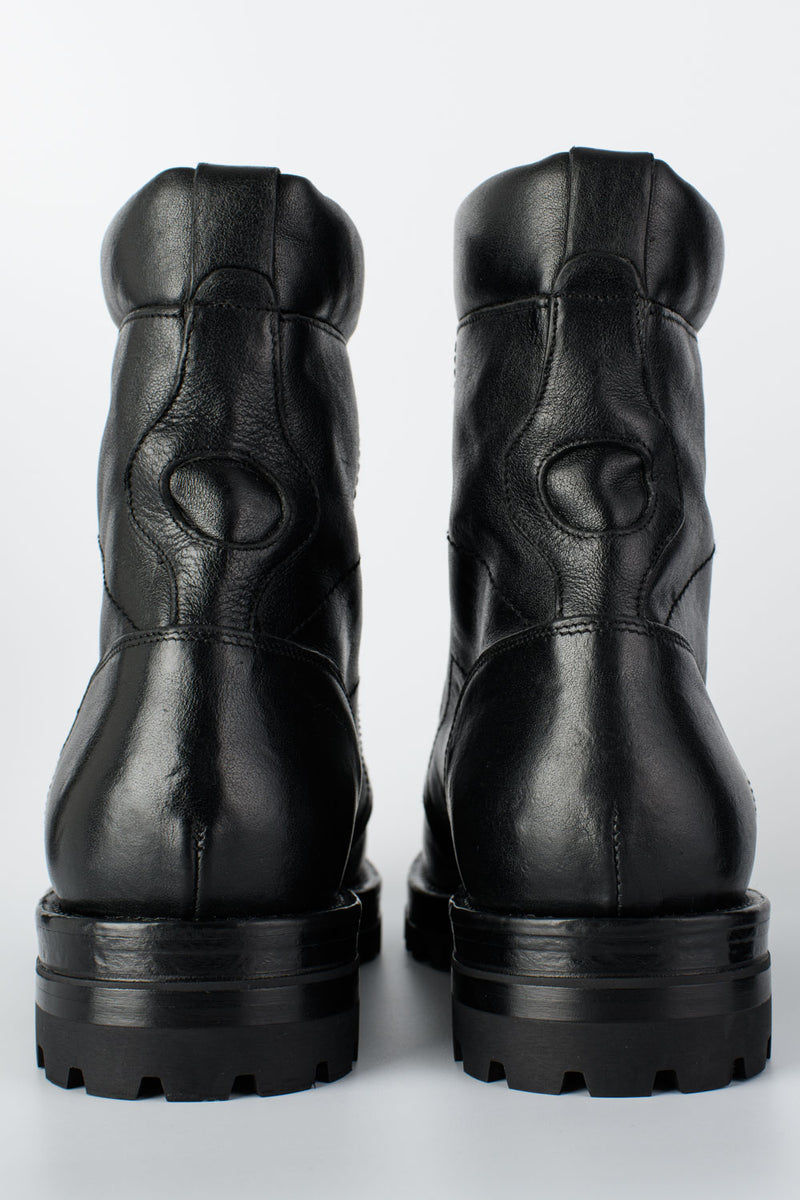 CAMDEN urban-black tactical combat boots.