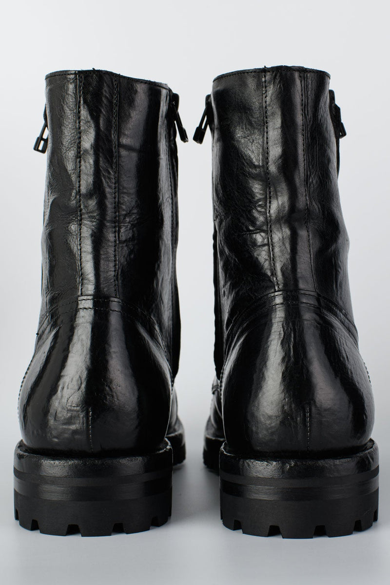 CAMDEN tar-black double-zip military boots.