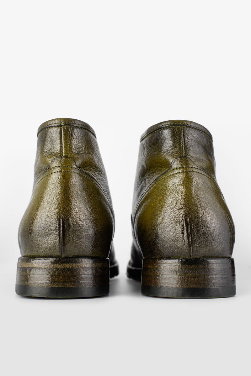 ASTON hunter-green chukka boots.