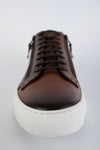 SOHO cocoa-brown double-zip patina sneakers.
