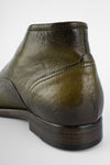 ASTON hunter-green chukka boots.