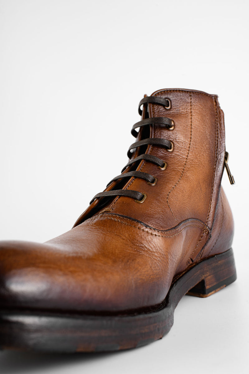 ASTON dry-terra asymmetric ankle boots.