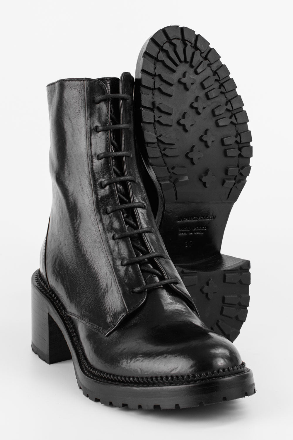 REGENT tar-black lace up boots.