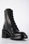 REGENT tar-black lace-up boots.