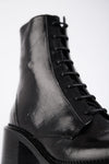 REGENT tar-black lace-up boots.