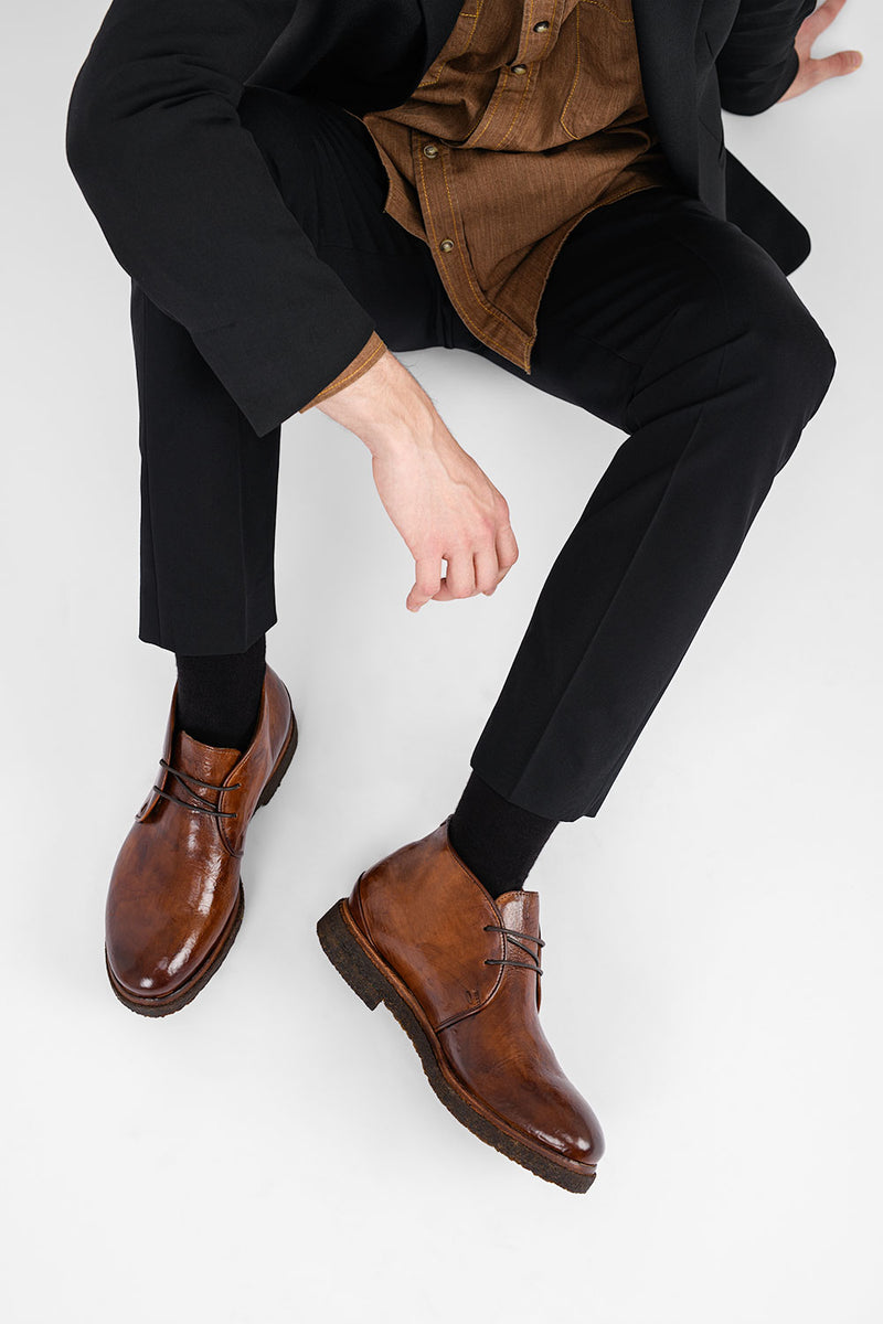 BROMPTON rich-brown chukka boots.