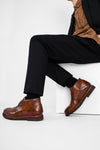 BROMPTON rich-brown chukka boots.