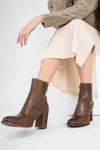 REID toasted-tan ankle boots.